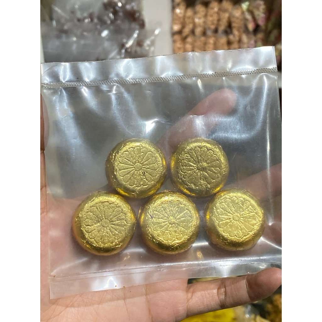 

coklat golden koin serba 7000