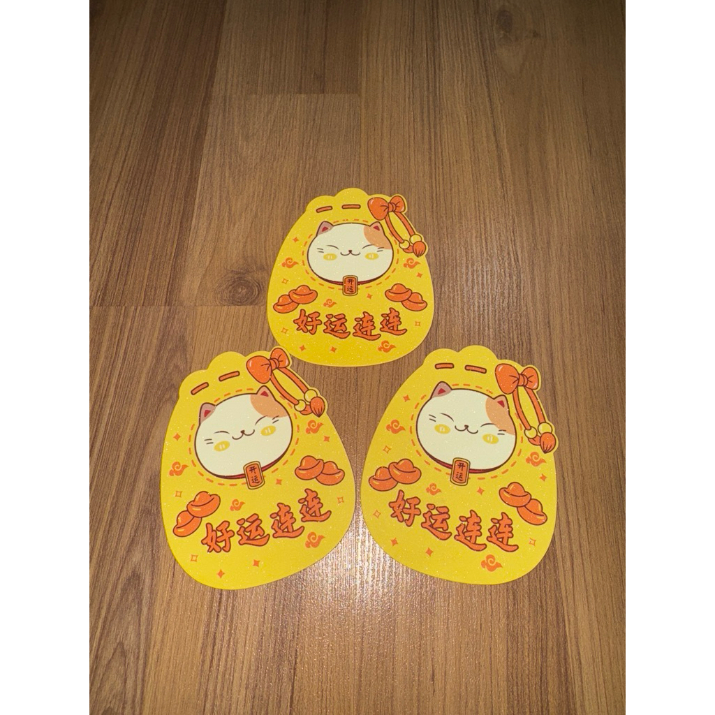 

angpao hongbao red pocket maneki neko lucky cat hongkong