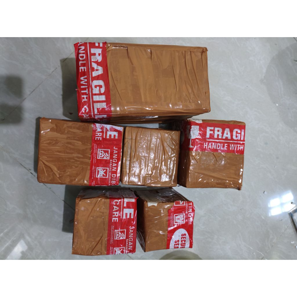 

BUBBLE WRAP DAN KARDUS 3 LAPIS