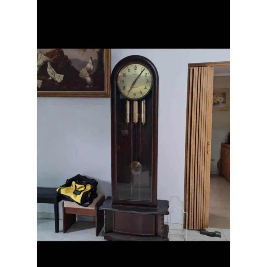 lemari jam hias kayu jati jepara