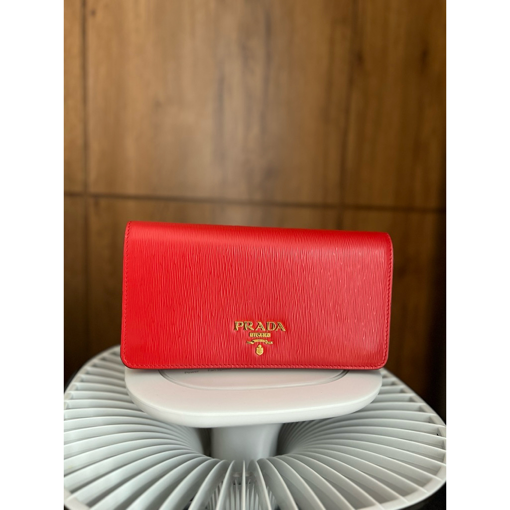 Prada red clutch on chain
