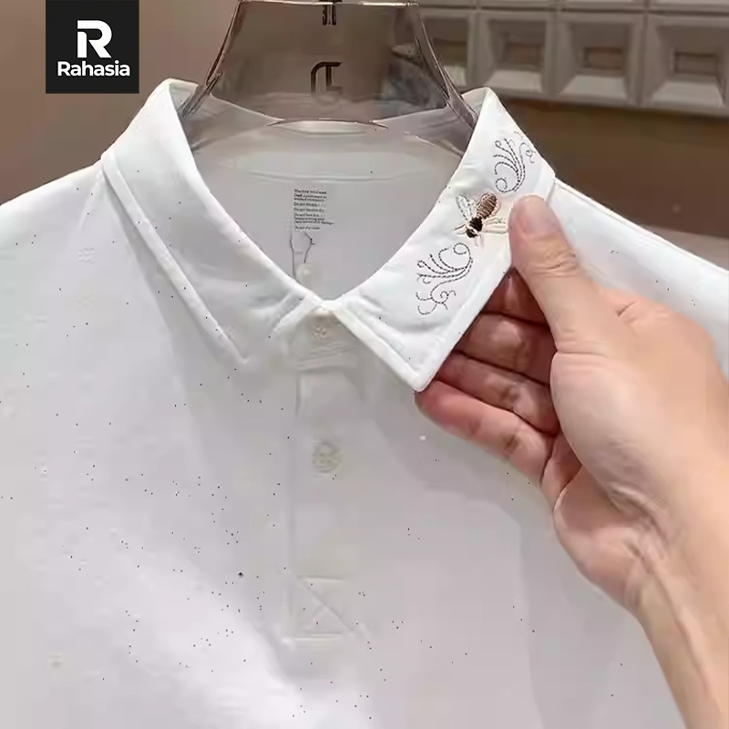 Kemeja polo putih pria dengan sulaman lebah