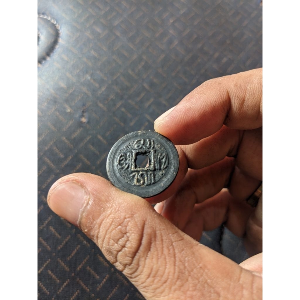 pis bolong aksara Bali