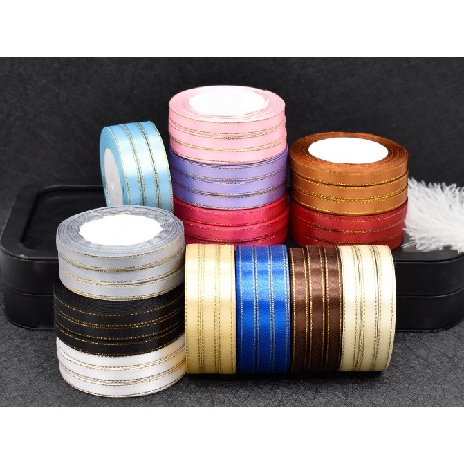 

PITA LIS EMAS PITA SATIN 1 CM 10MM 1 ROLL PITA KADO PITA BUKET