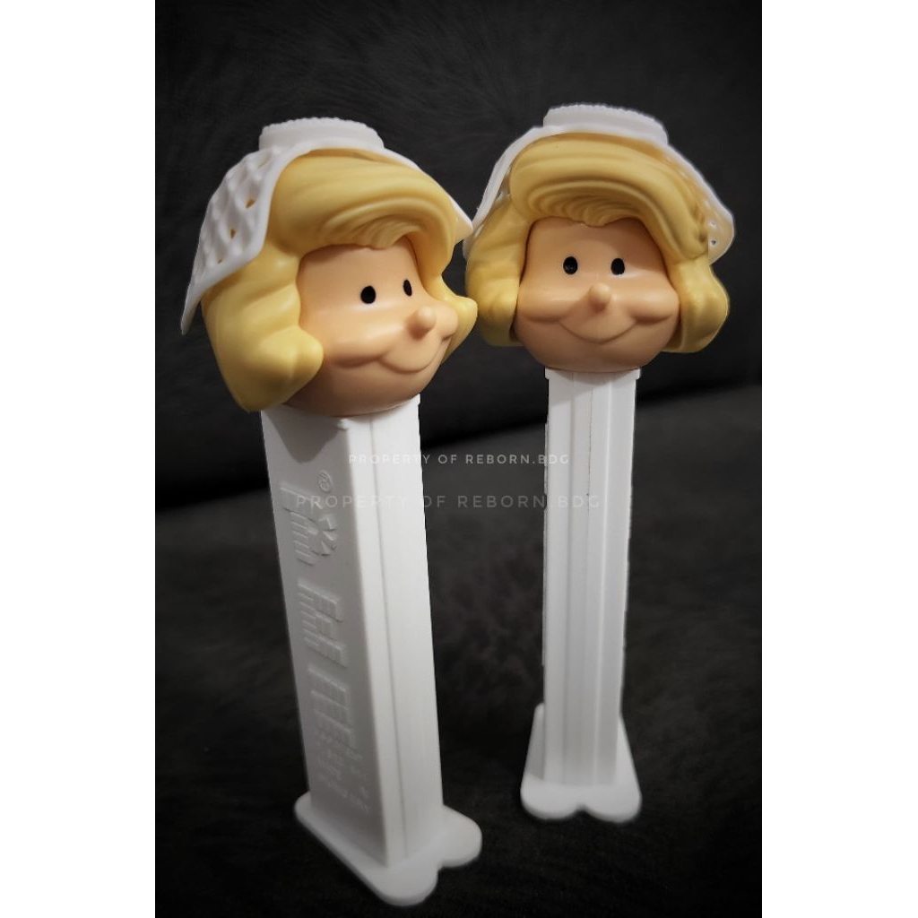

PEZ DISPENSER CANDY PERMEN BRIDE WITH BLOND HAIR ORIGINAL HUNGARIA