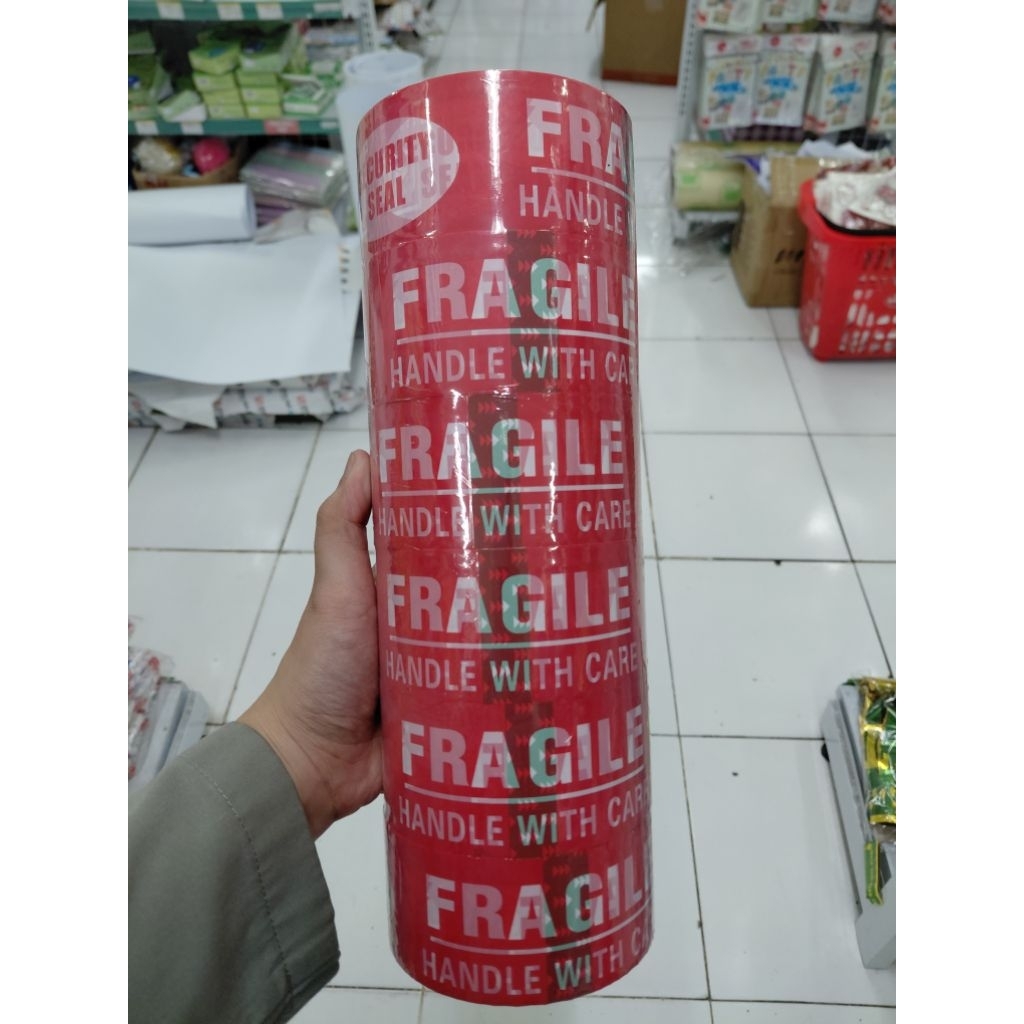 

Lakban Packing Fragile Handle With Care Warna Merah dan Putih Lebar 48 mm dan panjang 100 yard - 1 slop isi 6 roll