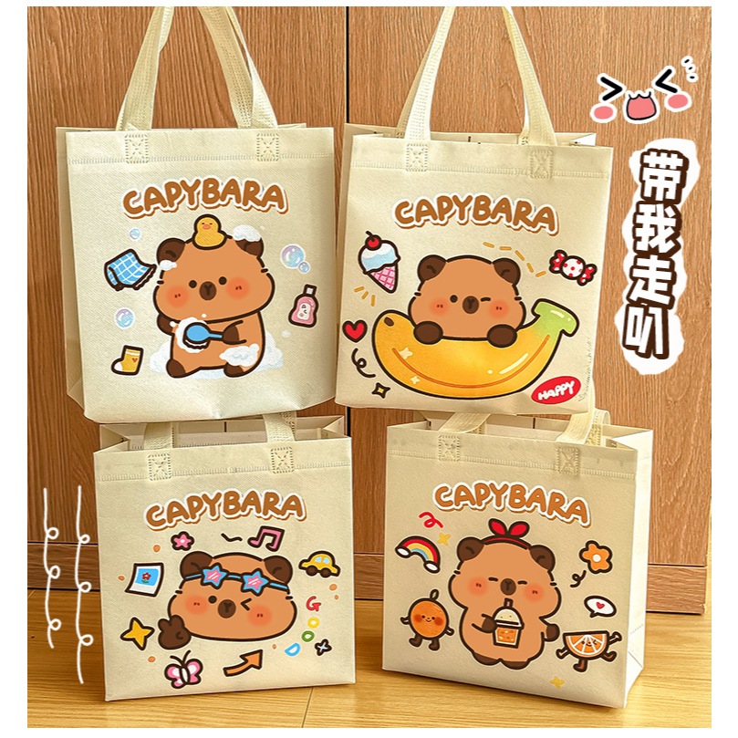 

TAS TOTE BAG GOODIE BAG NON WOVEN KARTUN MOTIF CAPYBARA / TAS TANGAN SOUVENIR