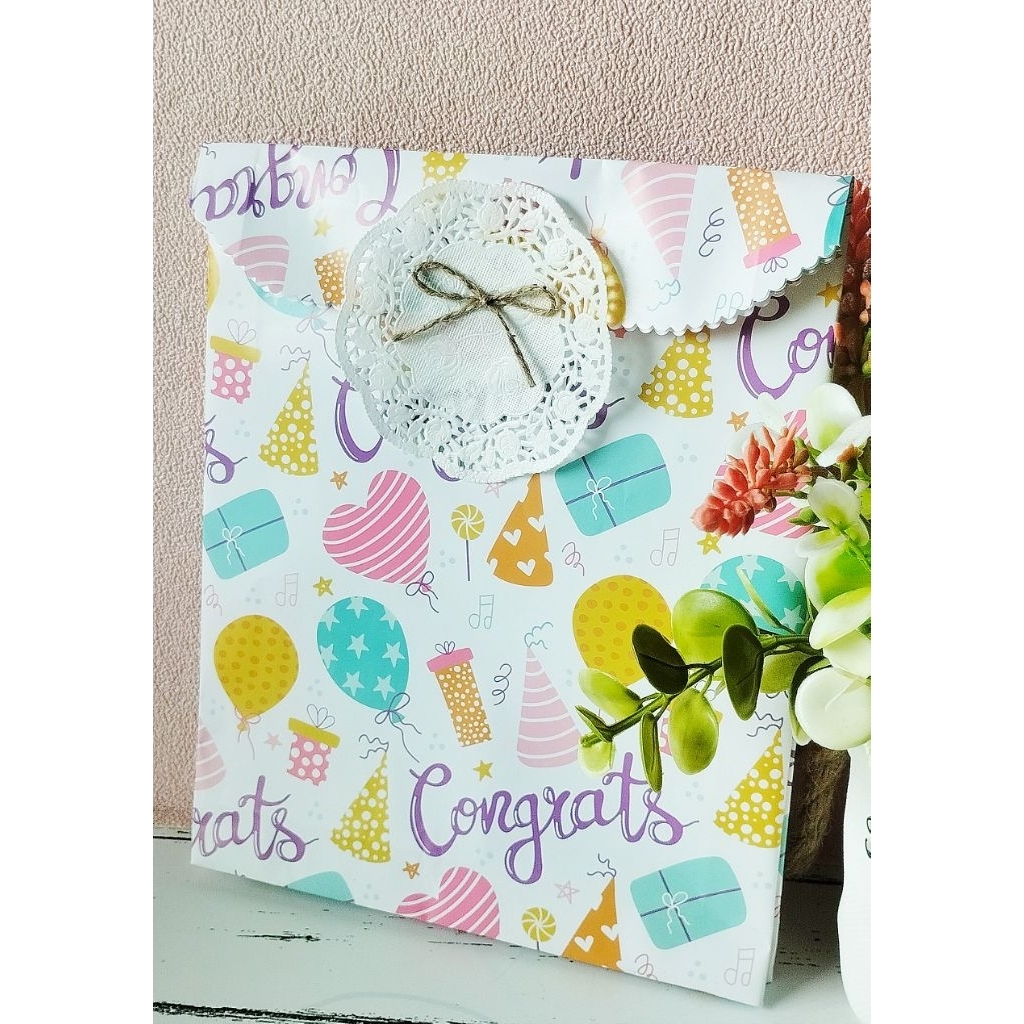 

Bungkus kado instan hiasan pita rustic ukuran sedang