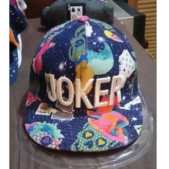 topi  snapback Joker full aop.tag wash only.