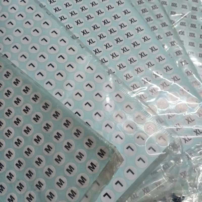 

SIZE TEMPEL PER PCS HURUF / Size Label XS,S,M,L,XL,XXL,XXXLPakaian Stiker bajuUkuran Kaos, Kemeja,