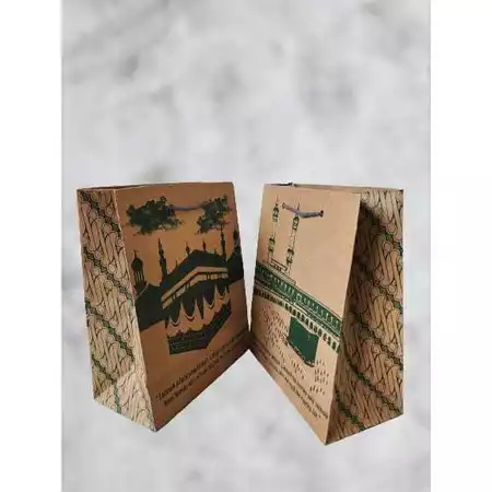 

Tas Kertas Souvenir HAJI atau UMROH t25x20x10 per 12 pcs / 1 Lusin