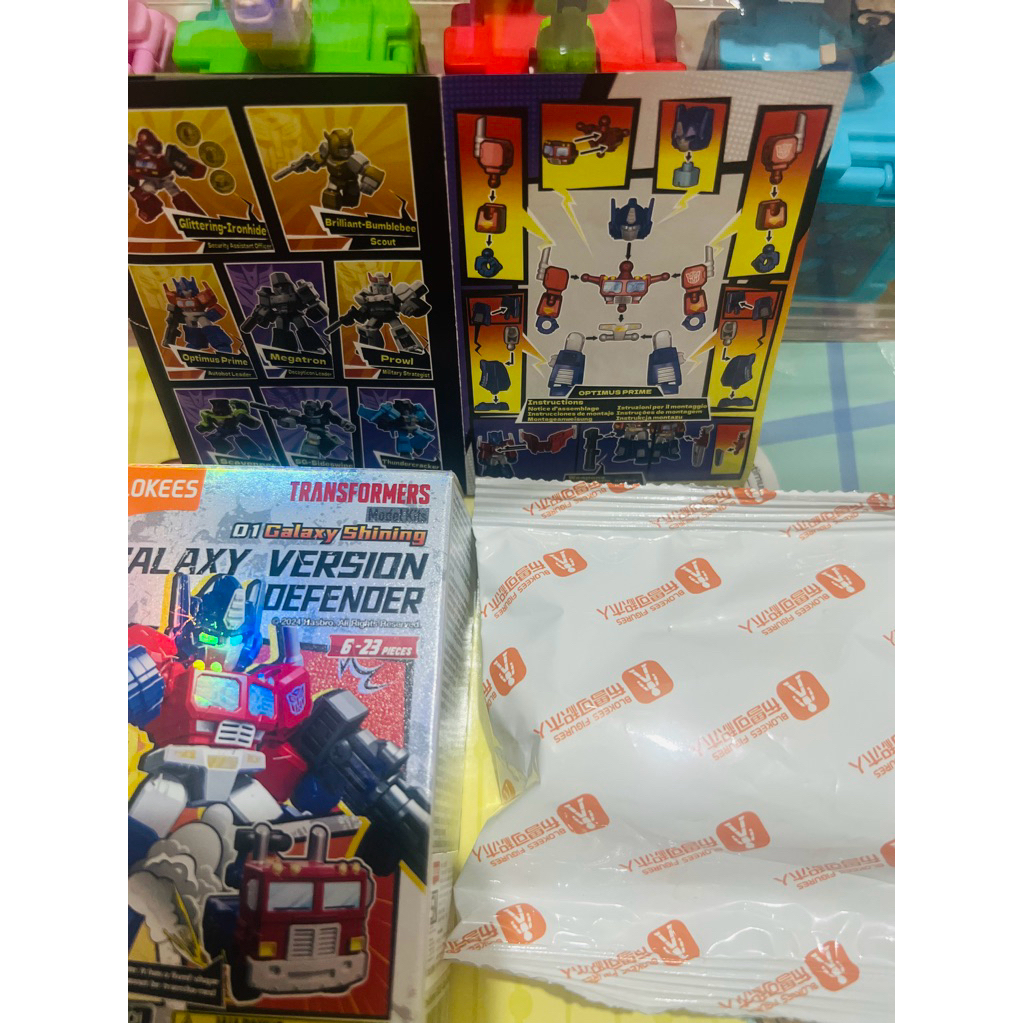 BLOKEES TRANSFORMERS DEFENDER VOL 01 SUPER SECRET OPTIMUS PRIME MEGATRON OFC