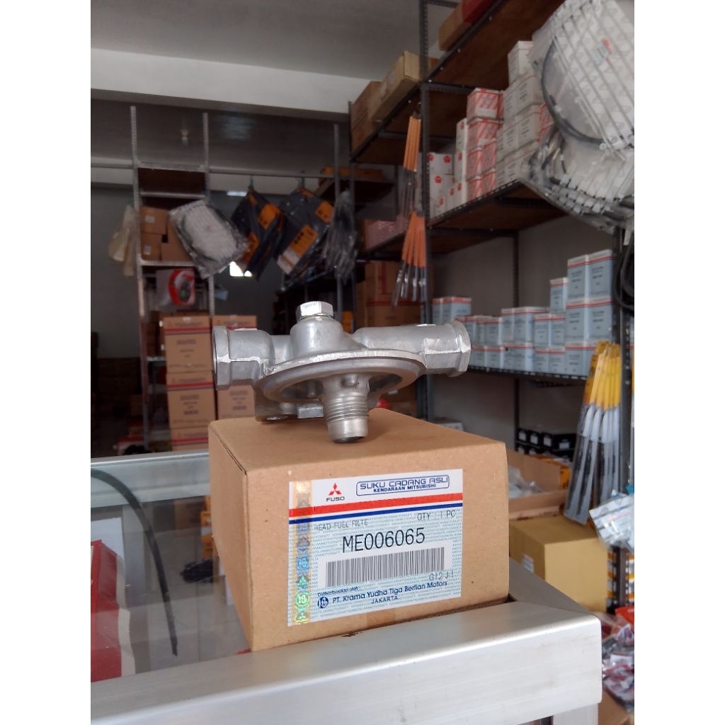 Head Fuel Filter Canter ME006065 ori Genuine Mitsubishi