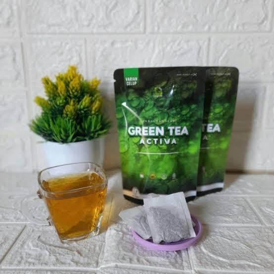 

Green tea activa celup isi 14 tea bag Teh Hijau Teh Aktiva Pelangsing Badan alami