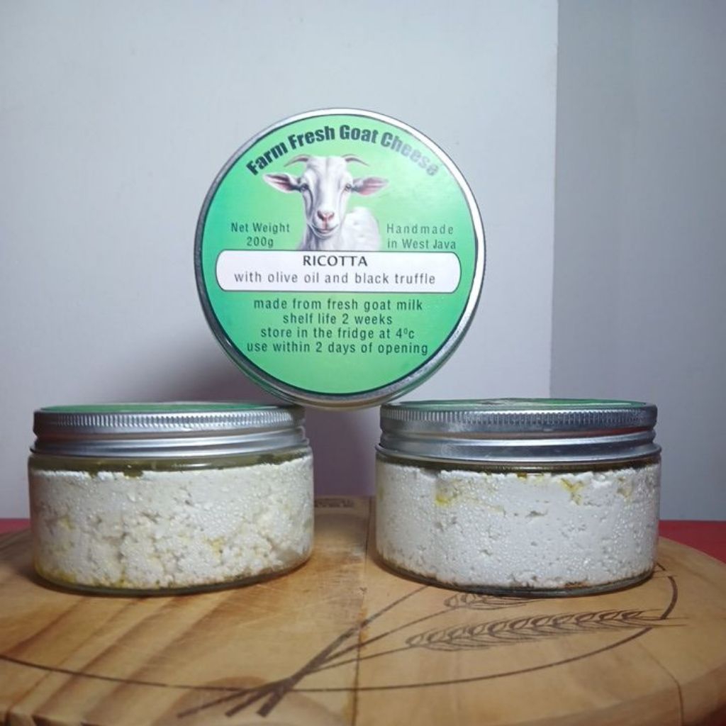 

Goat Cheese Ricotta with Olive Oil end Black Truffle