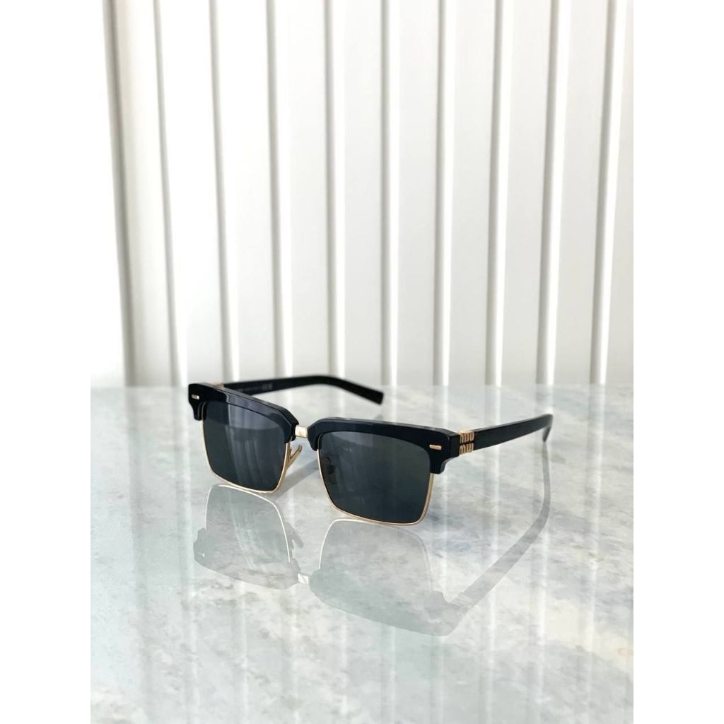 Miumiu Logo Sunglasses in Black Gold