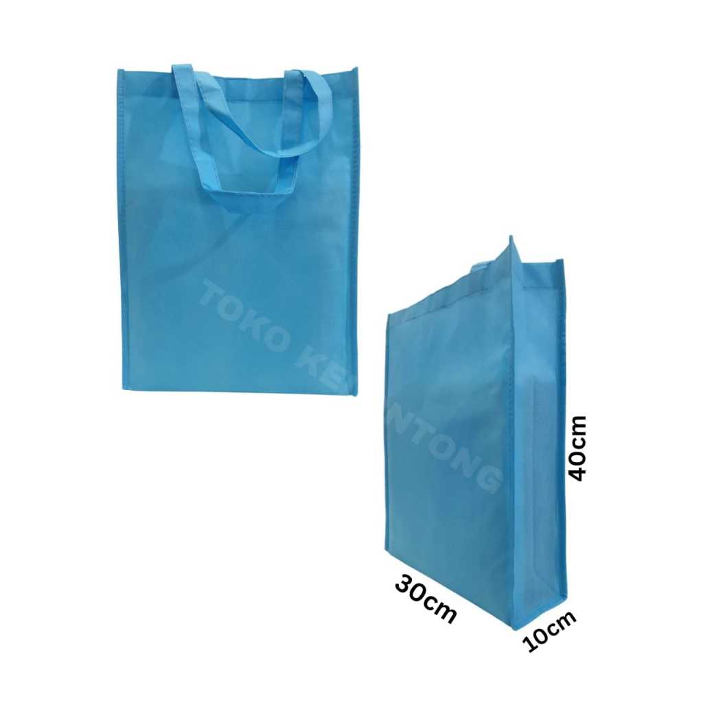 

Tas Kain atau goodiebag full jahit bahan spunbond 75 GSM dengan perekat
