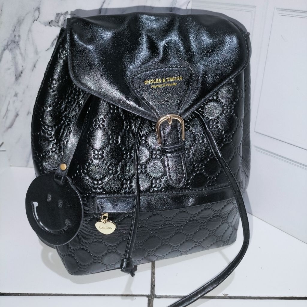 ransel kecil.kulit asli.brand CNOLES & DESIGN.bekas.minus.baca deskripsi