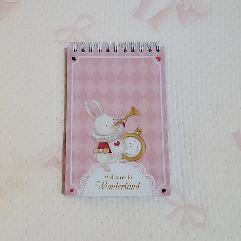 

jasmine tease welcome to wonderland notepad