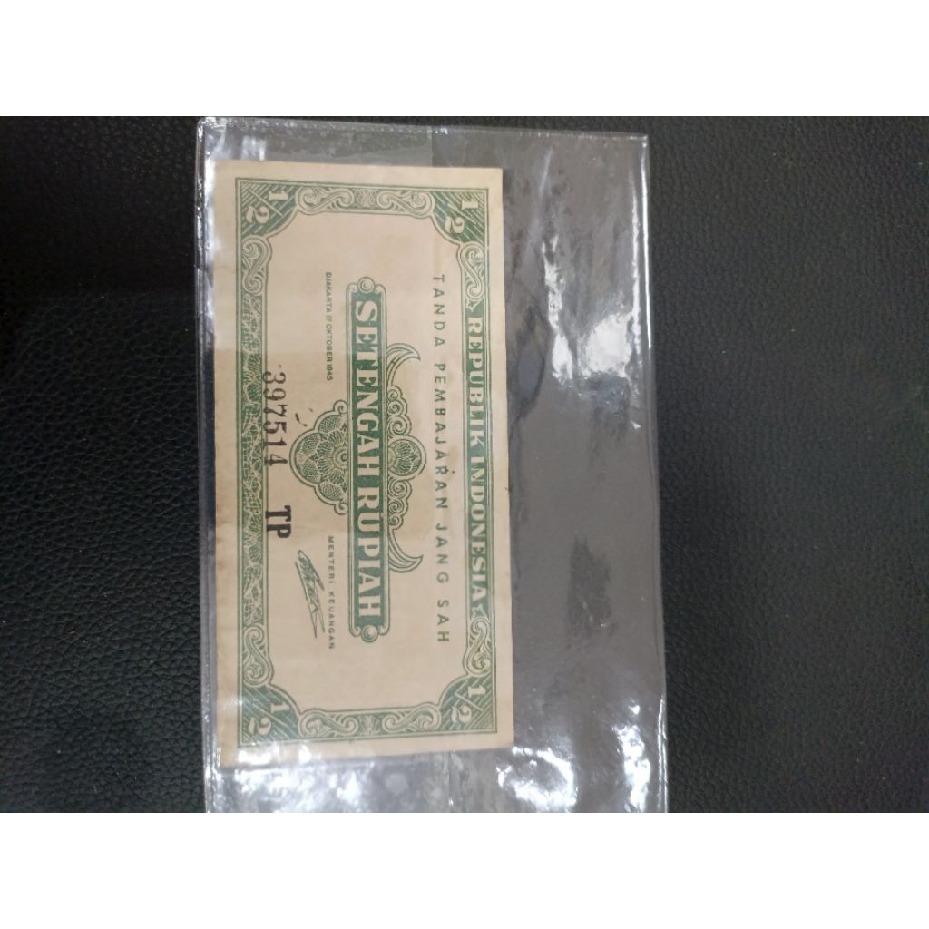 Uang kuno setengah Rupiah thn 1945 ORI no seri : 397514 TP