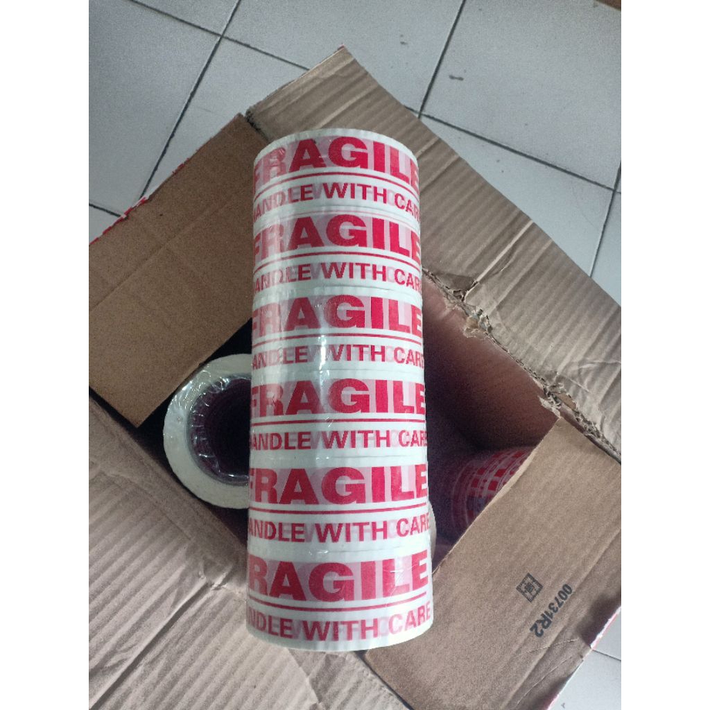 

Lakban SKS Opp Tape 2 inch 48mmx100 yard Fragile warna dasar putih tulisan Merah