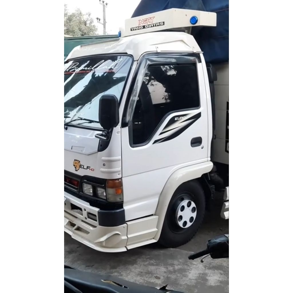 Selebor Truk Elf Macan – Variasi Kabin Kuat & Stylish