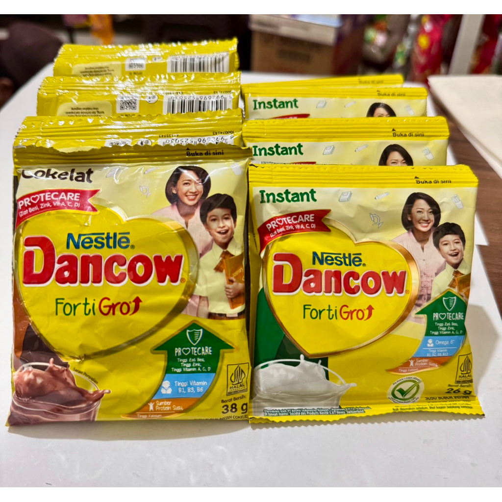 

Dancow Fortigro Susu bubuk Original instant / coklat sachet Per renteng