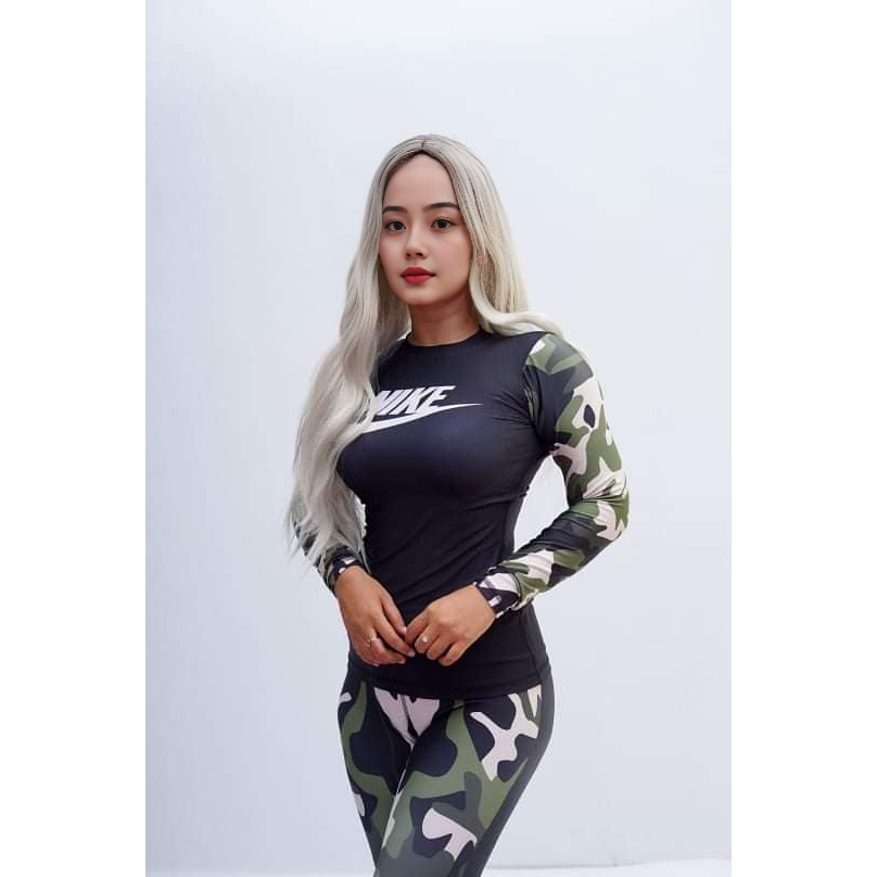 baju olahraga wanita logo nike ,baju senam , aerobik
