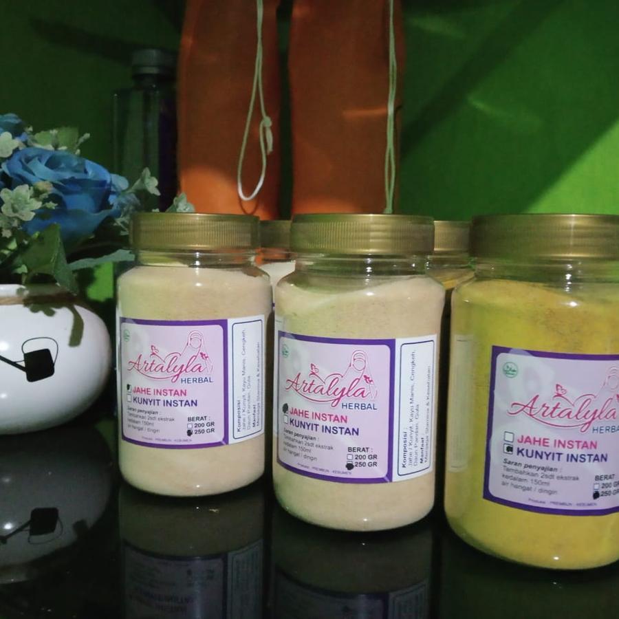 

minuman tradisional herbal jahe dan kunyit bubuk instan kemasan kaca praktis