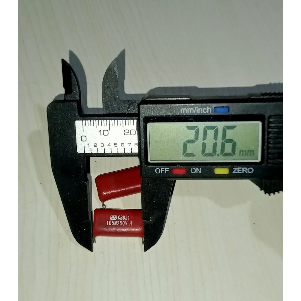 KAPASITOR CBB21 105M250V H BEKAS CABUTAN