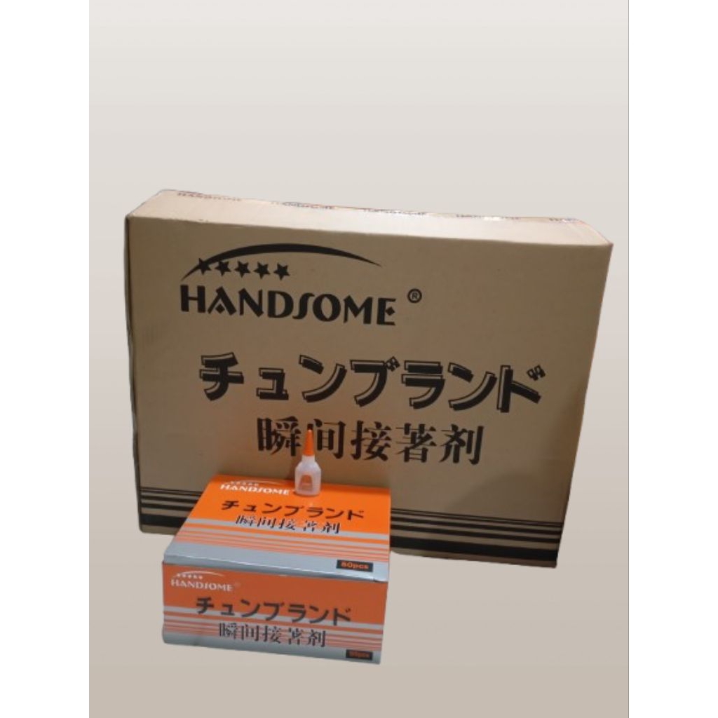 

1Dus Isi 600 Pcs Lem Cair ,Lem Korea, Lem Tetes Merk Handsome Tutup kuning