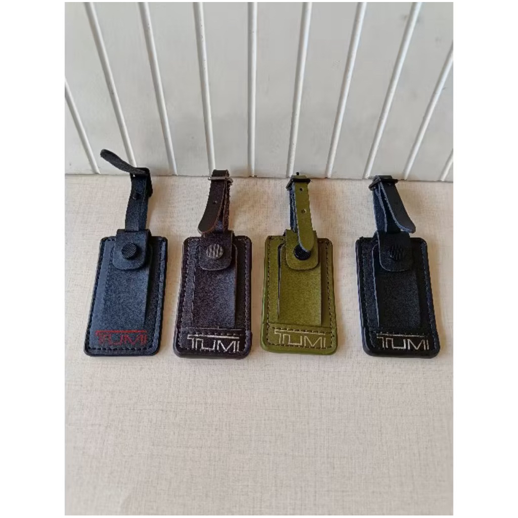 

GANTUNGAN NAMETAG KULIT