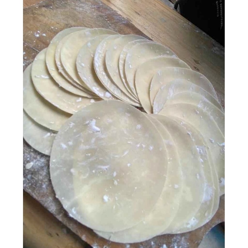 

KULIT DIMSUM/GYOZA/SIOMAY/DUMPLING DIAMETER 9cm