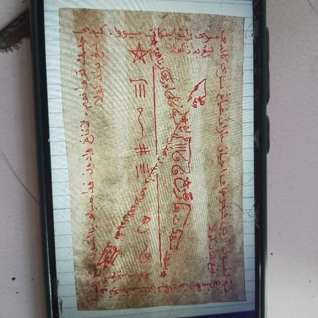 lusikan tangan rajahan