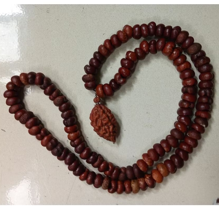 Kalung biji rotan/bandul Jenitri m2/warna coklat tua dan kuning/sangat keras