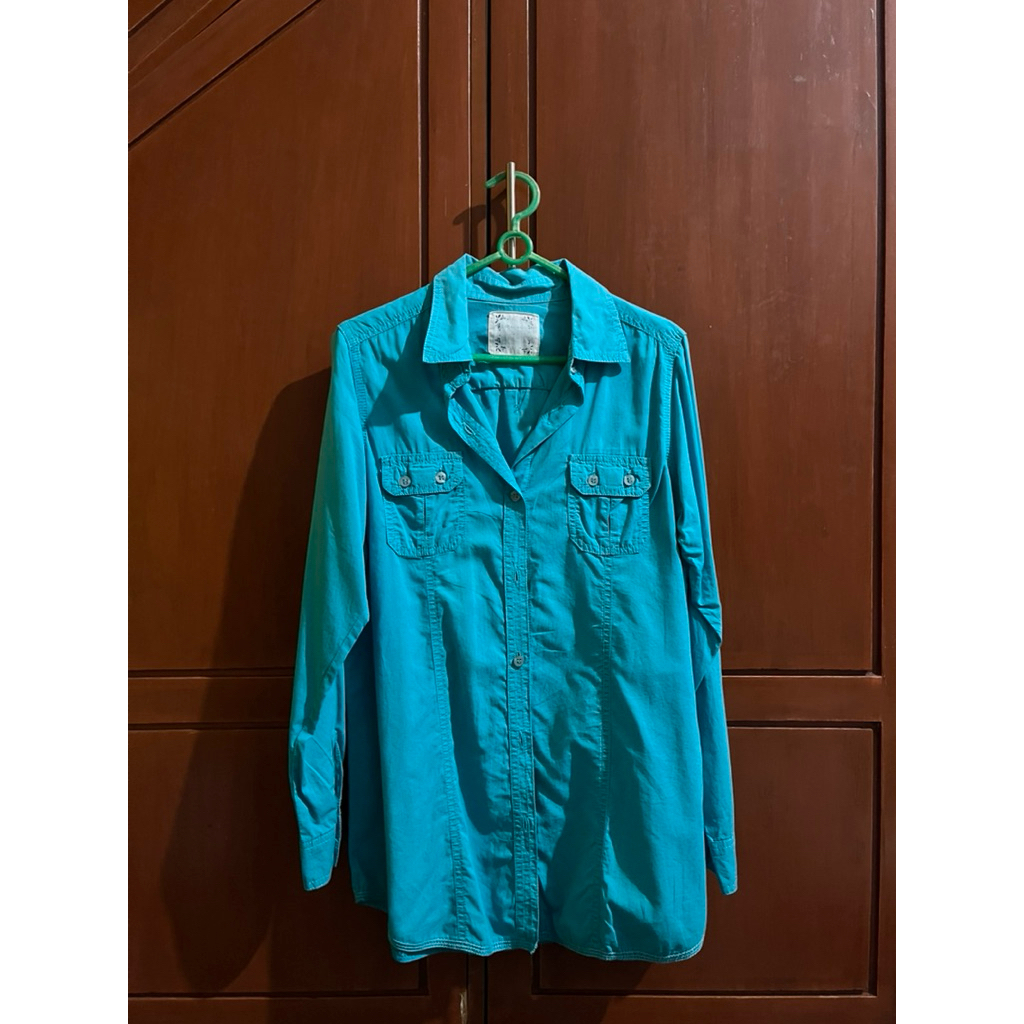 Kemeja biru tosca