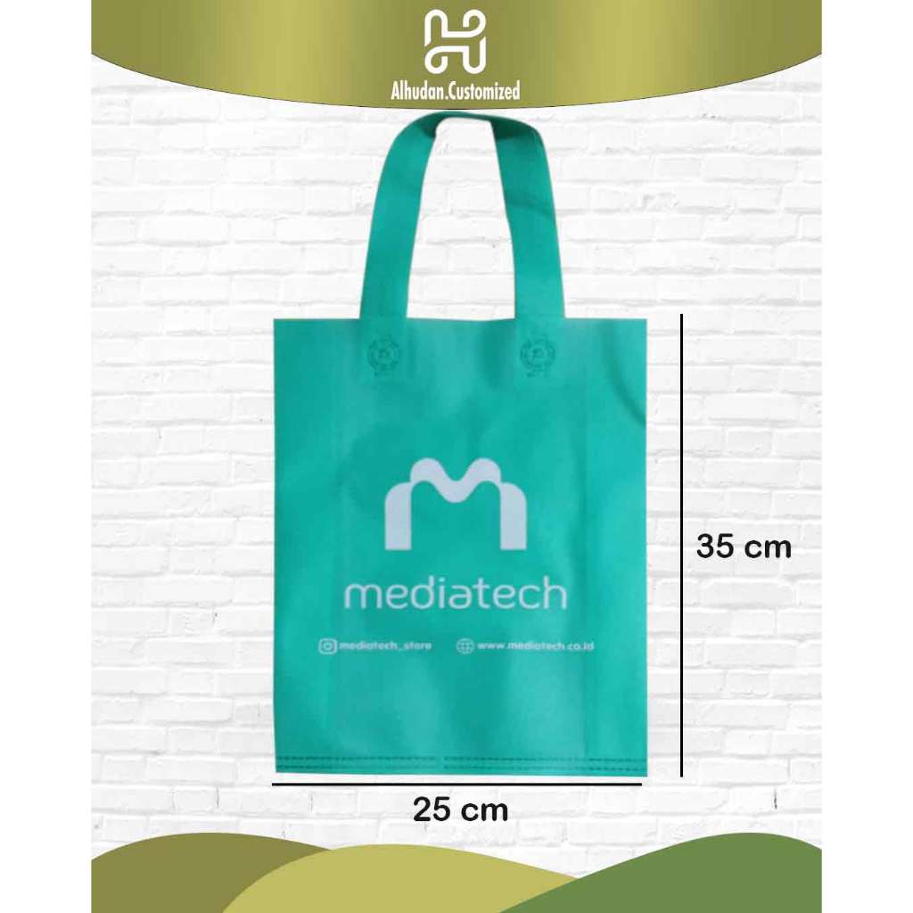 

Tas Kantong Kain Spunbond Goodie Bag Custom Sablon Press Handle 25x35