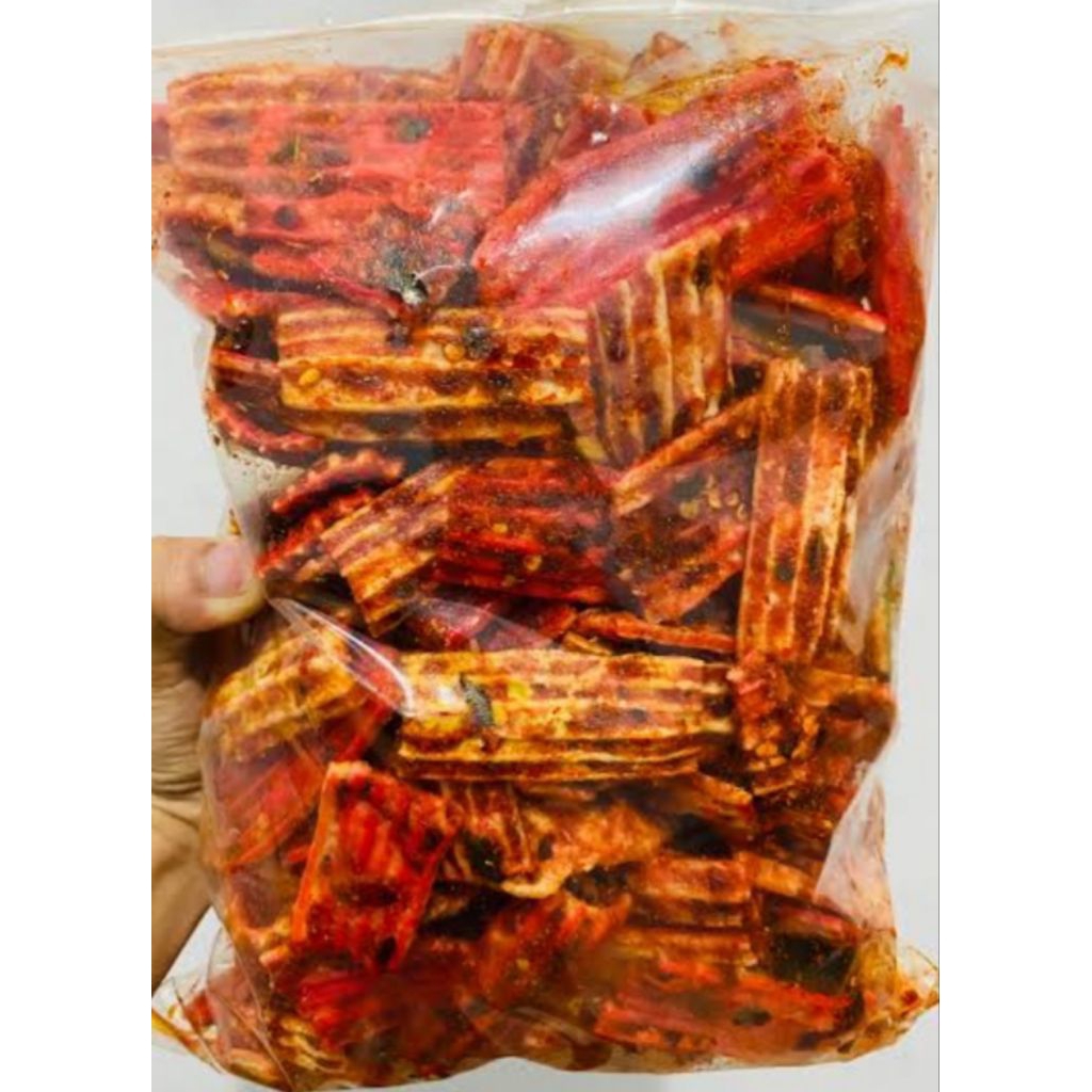 

Kerupuk sisir warna pedas gurih aroma daun jeruk kemasan 250 gram