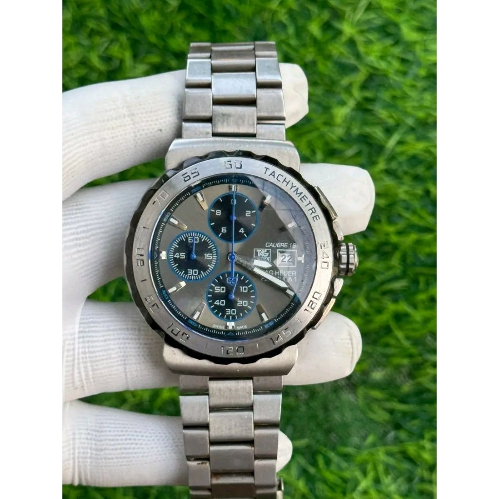 TH formula 1 calibre 16 quartz military divers not omega tudor