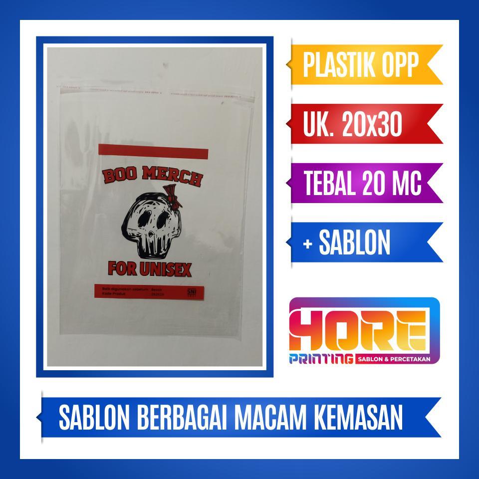 SABLON PLASTIK 2 WARNA OPP BAJU (OPP PEREKAT)
