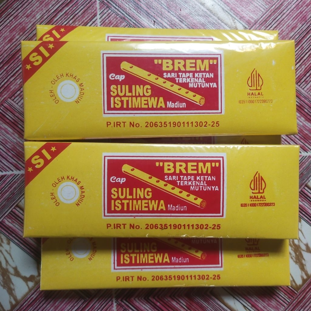 

BREM Sari Tape Ketan Terkenal Mutunya Cap Suling Istimewa Madiun