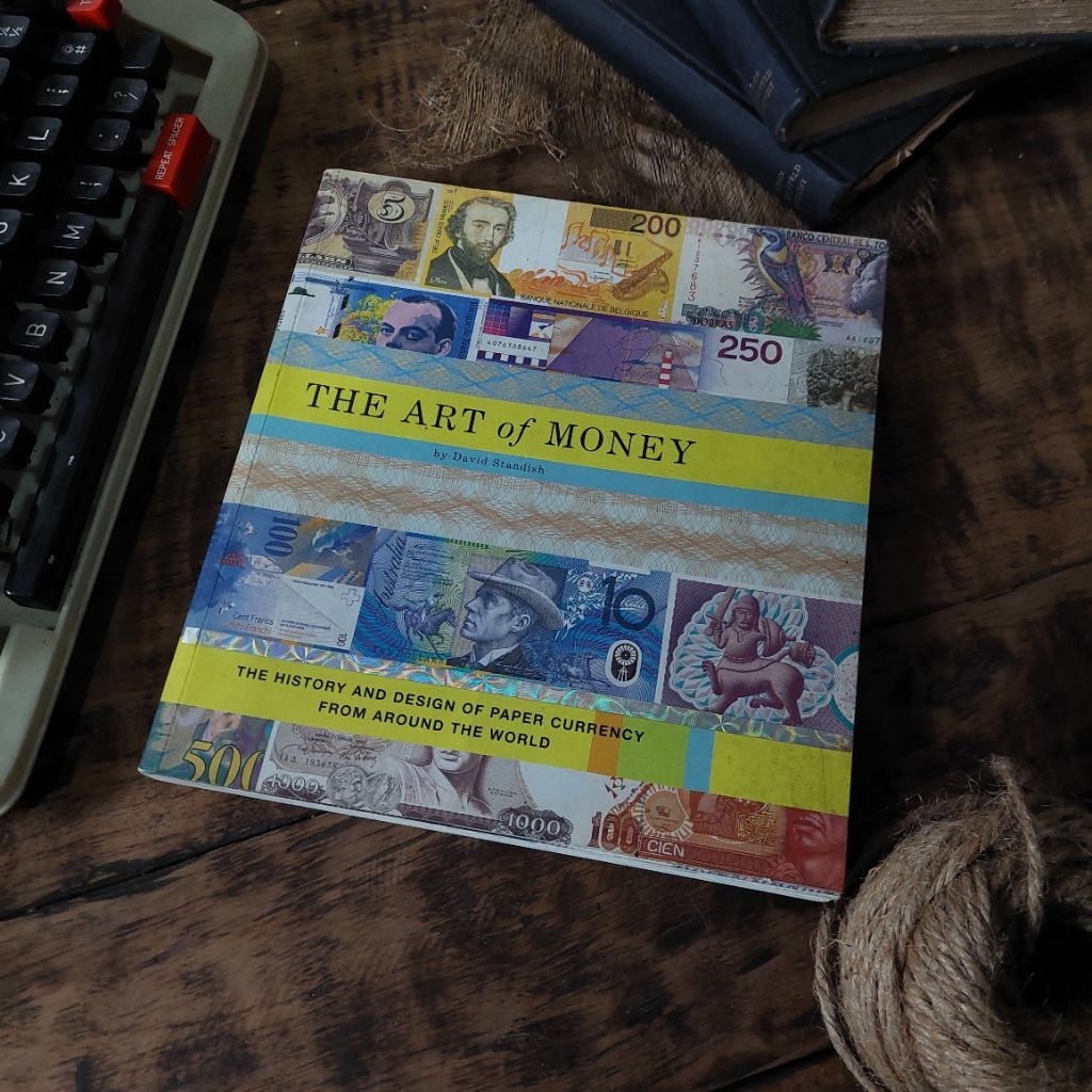 THE ART OF MONEY : THE HISTORY AND DESIGN OF PAPER CURRENCY FROM AROUND THE WORLD Oleh : David Stand