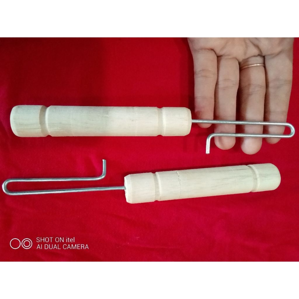 alat ikat es Mambo/es lilin