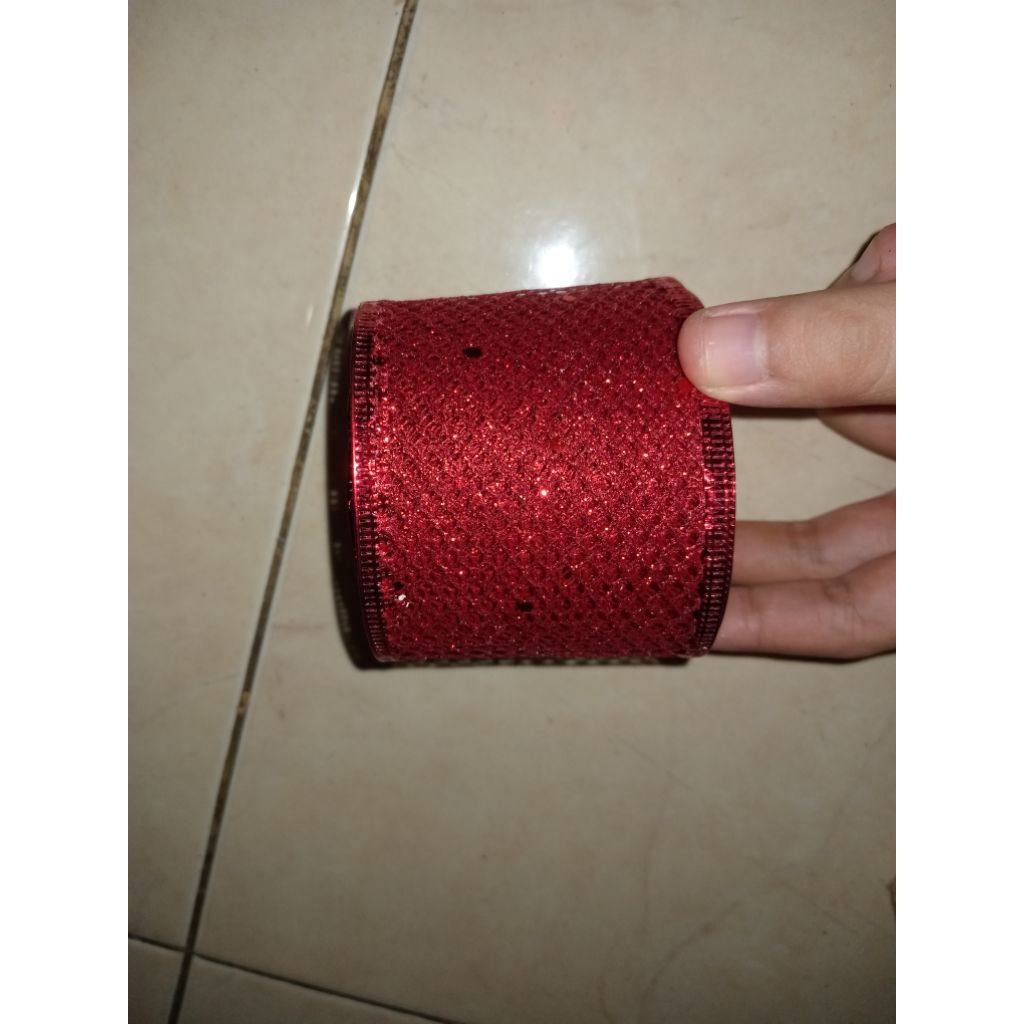 

Pita Merah Natal Jala Gulungan