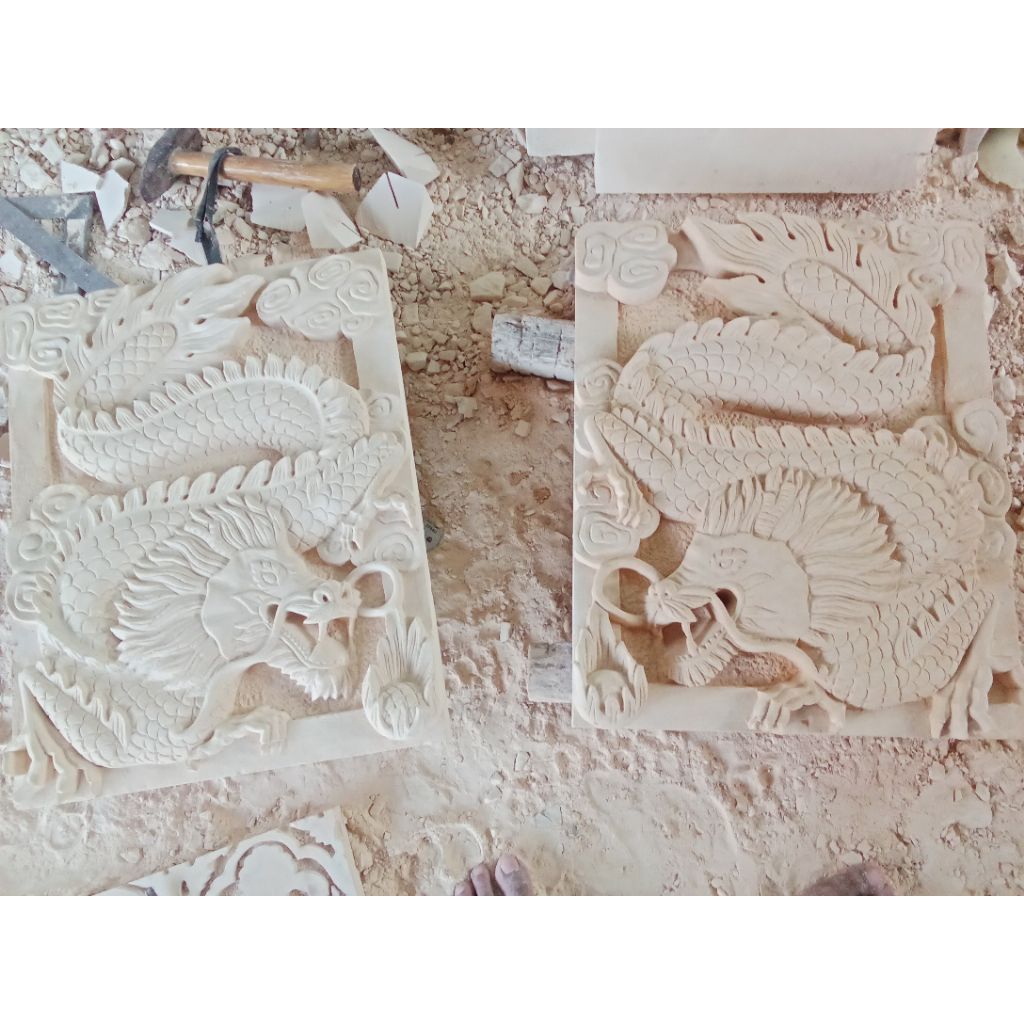 relief naga hiasan dinding ukir batu alam