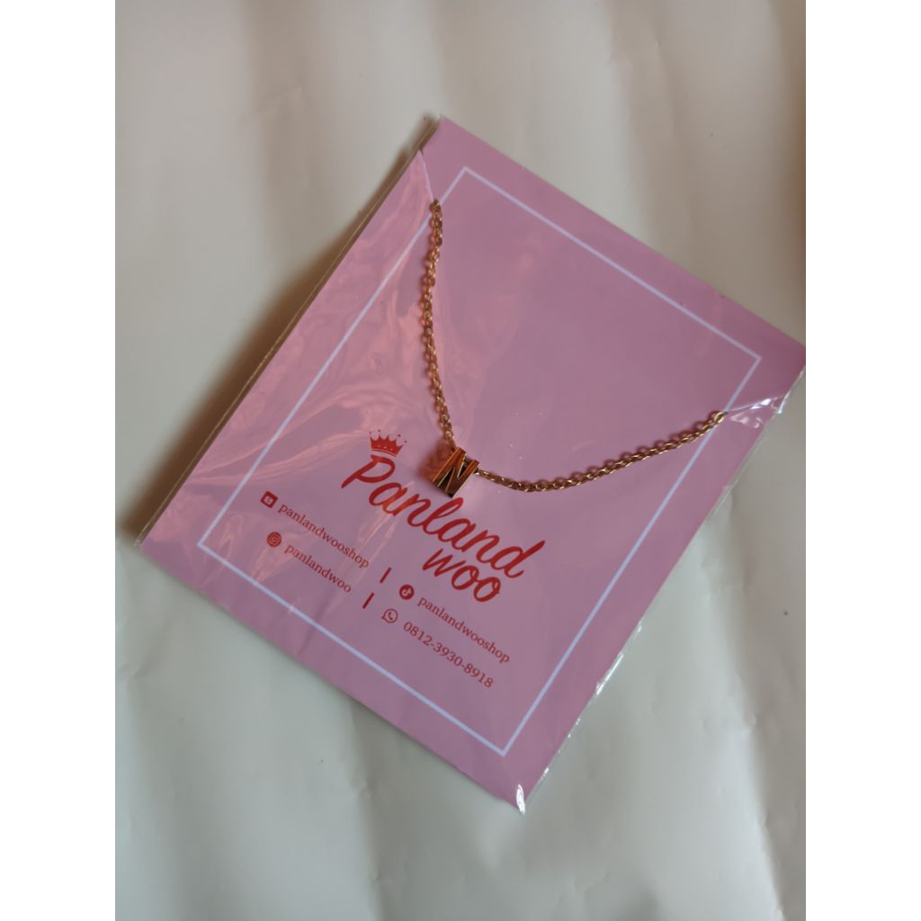 Kalung Huruf Titanium N