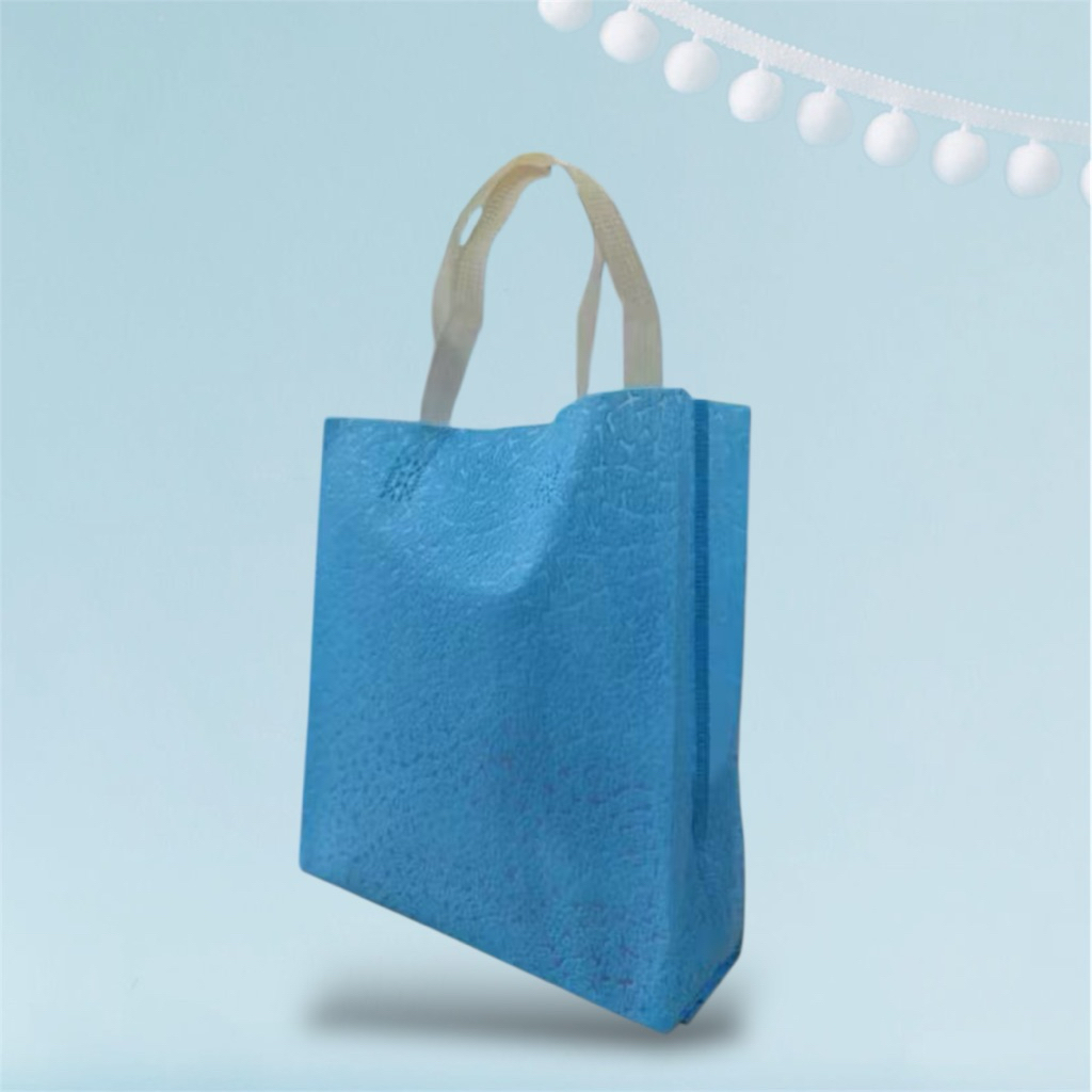 

Tas Spunbound Emboss Tekstur Goodie Bag Souvenir Tas Kado Gift Hampers Tas Snack Tas Oleh Oleh