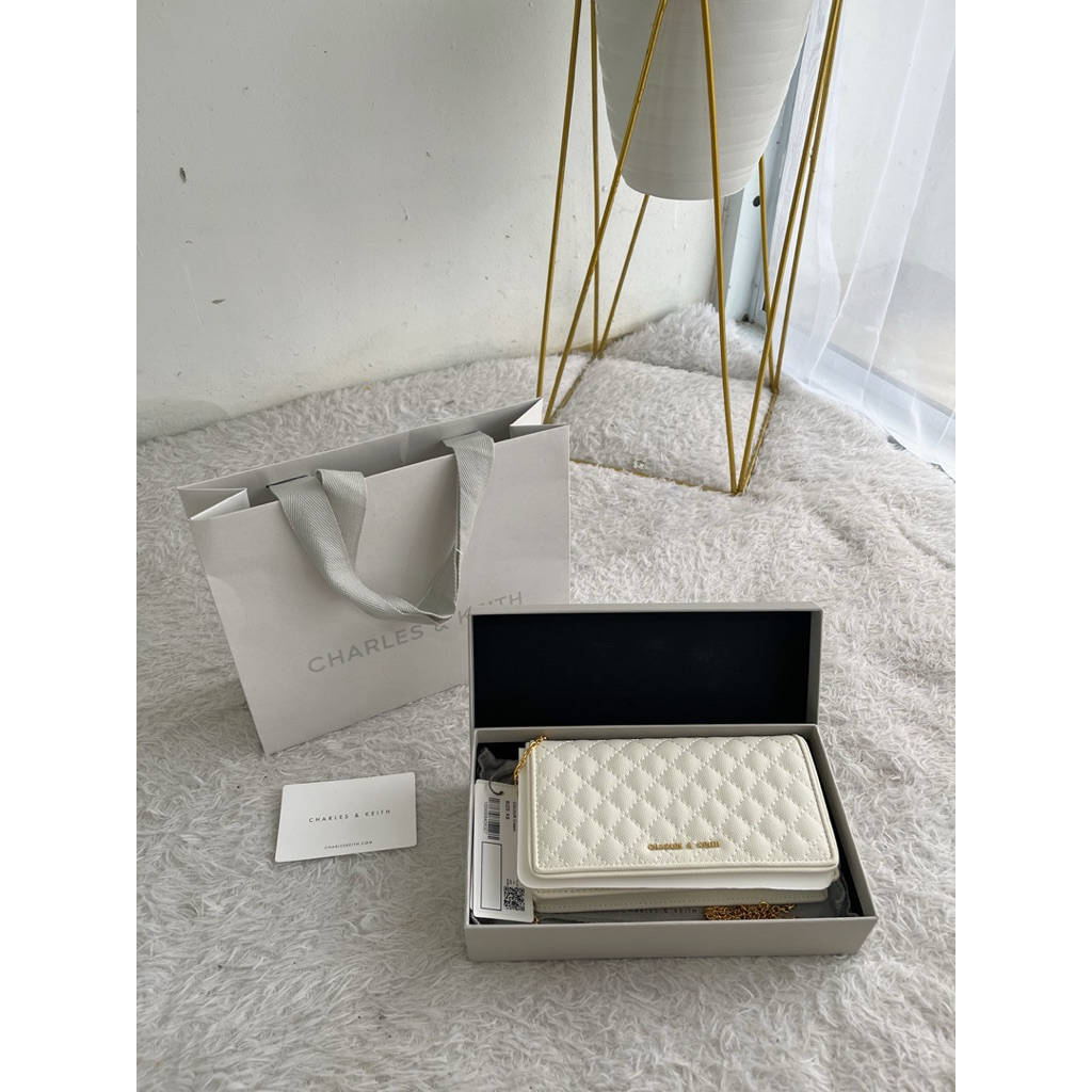 CHARLES & KEITH wallet on chain ivory