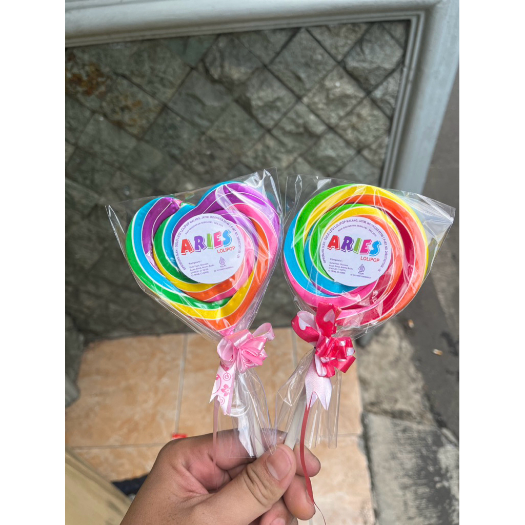 

Permen Lolipop Diameter 7 cm bentuk Hati ( isi 50 pcs)
