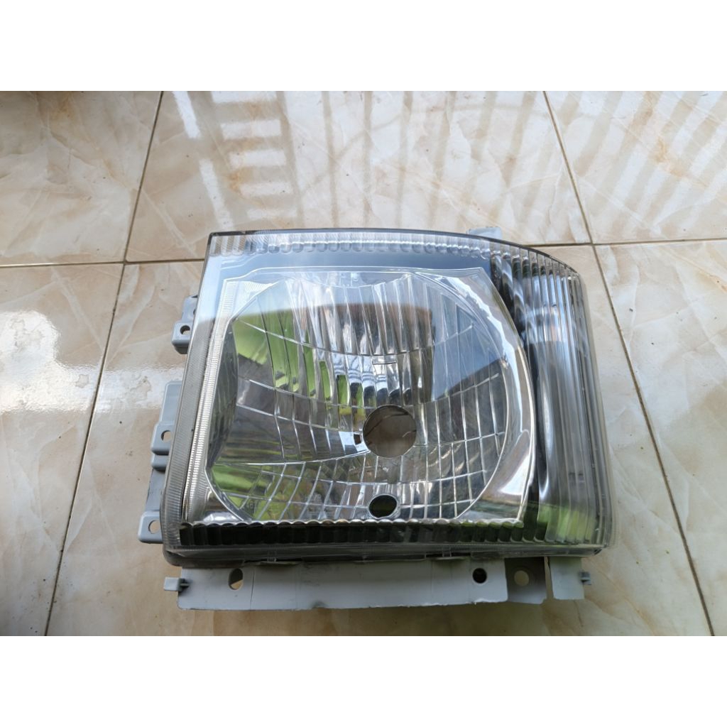 lampu depan HedLamp Isuzu NMR ELF Giga Original